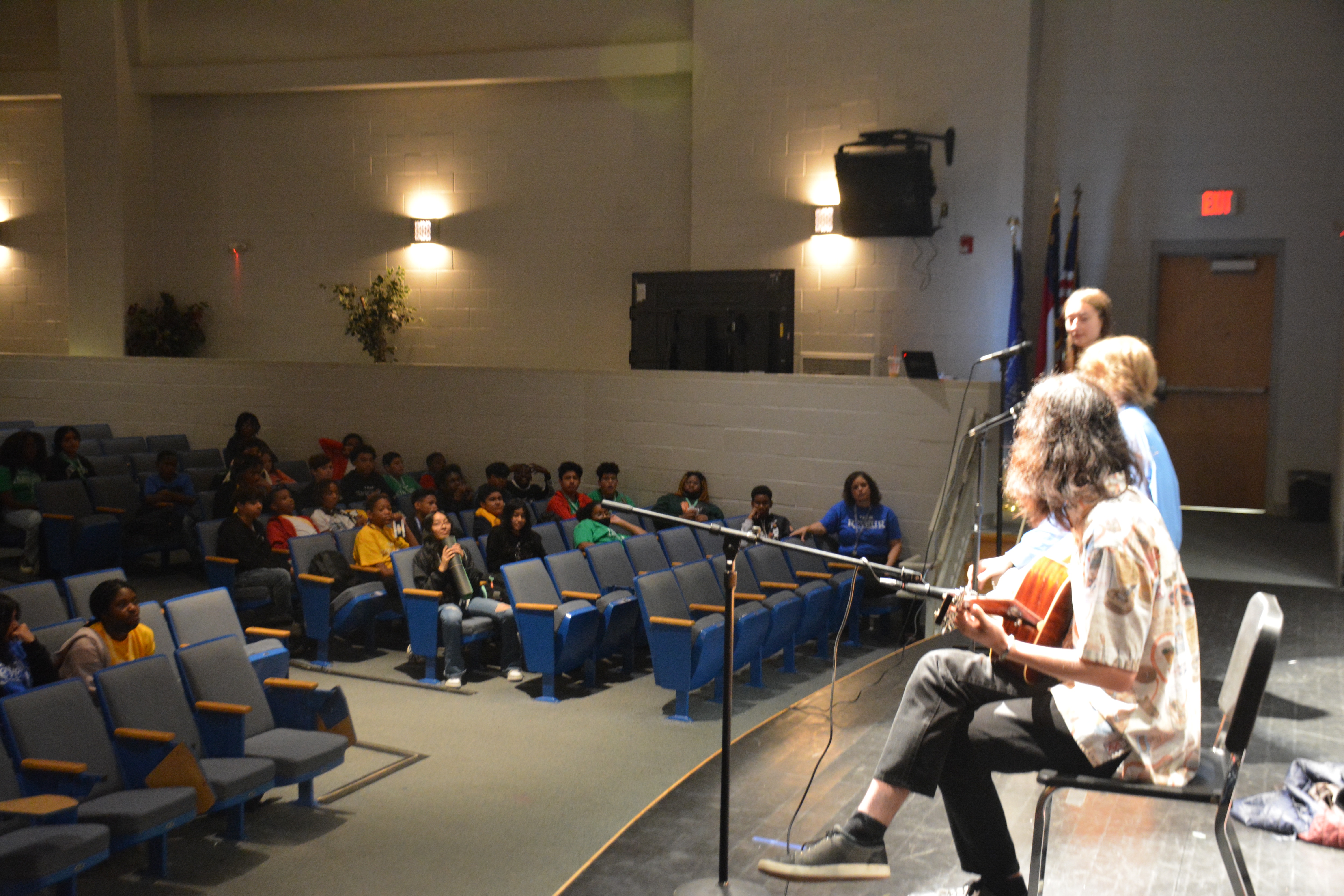 Sho performing for a North Carolina middle school